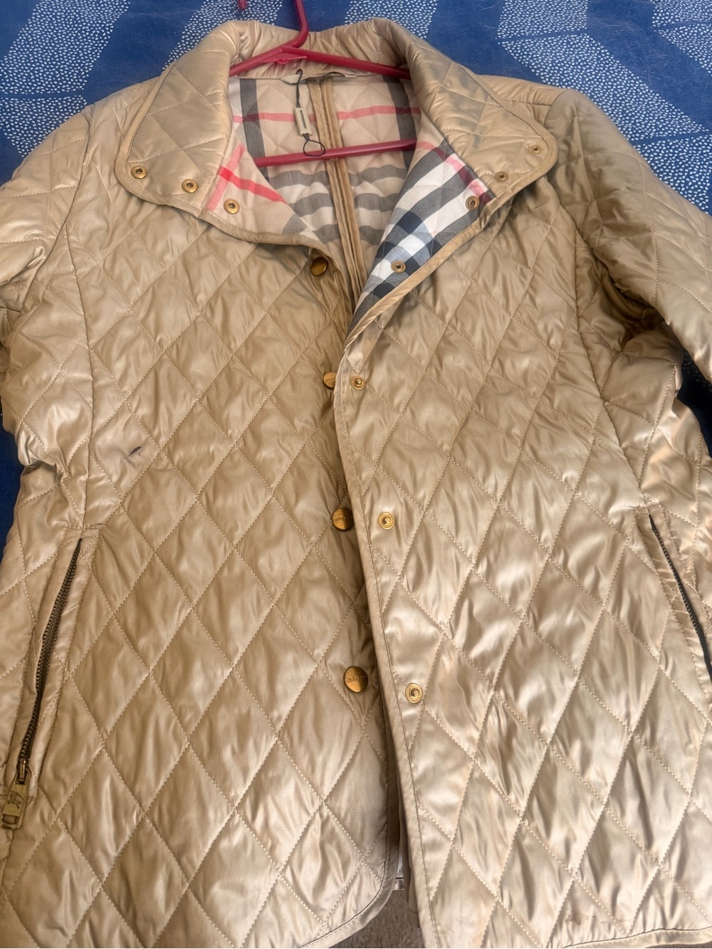 Burberry Quilted Champagne Puffer Jacket with Signature Check Linings.